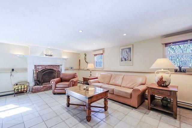 living area featuring a fireplace, a wealth of natural light, and recessed lighting