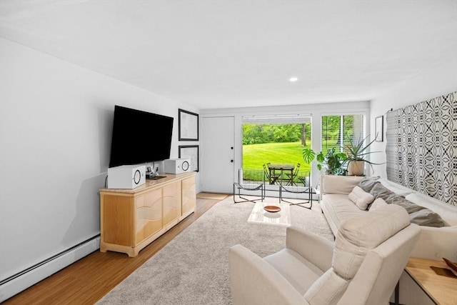 301 Neponset St Unit 12A, Norwood, MA 02062 - living area featuring baseboard heating, light wood finished floors, and recessed lighting