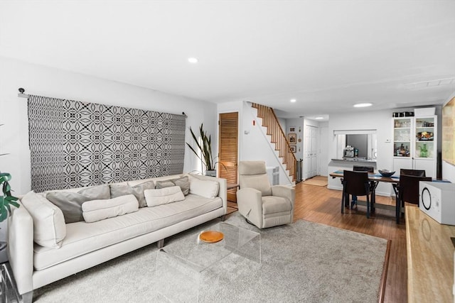301 Neponset St Unit 12A, Norwood, MA 02062 - living room with stairs, recessed lighting, and wood finished floors
