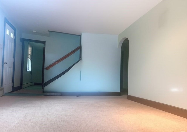 59 Katherine St, Weymouth, MA 02191 - unfurnished room featuring carpet floors and arched walkways