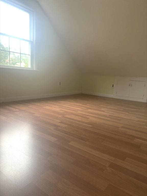 59 Katherine St, Weymouth, MA 02191 - additional living space featuring vaulted ceiling, light wood-style flooring, and baseboards
