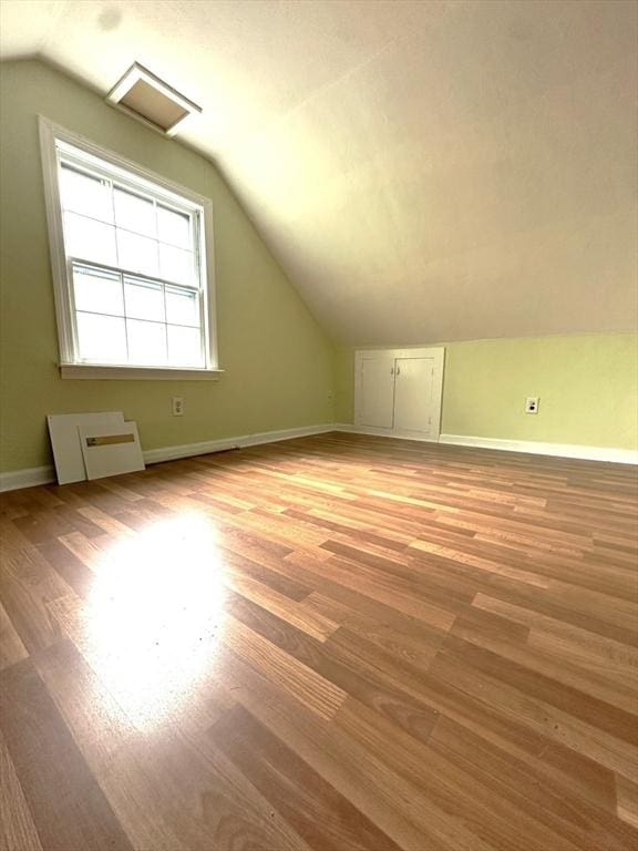 59 Katherine St, Weymouth, MA 02191 - bonus room with vaulted ceiling, light wood-style floors, and baseboards