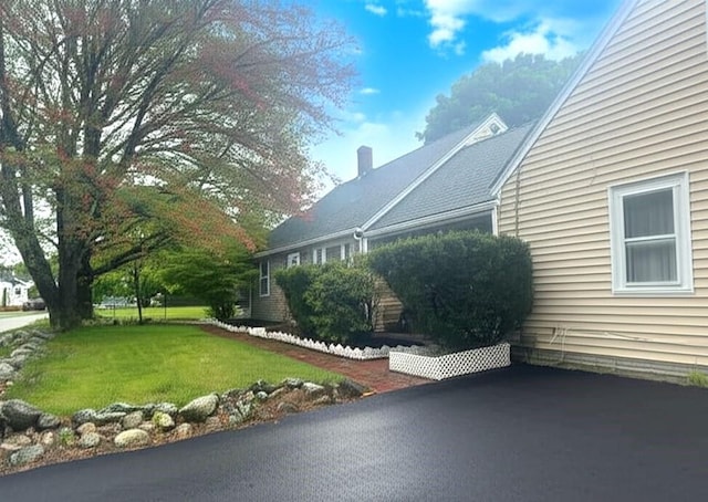 59 Katherine St, Weymouth, MA 02191 - view of side of home with a yard and a chimney