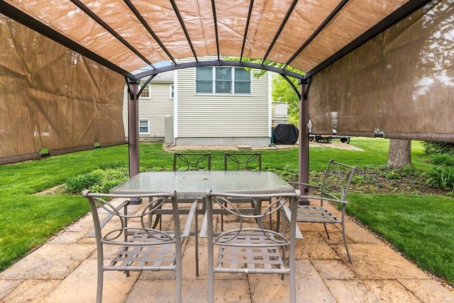 view of patio with outdoor dining area and a pergola