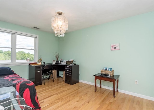 140 College Farm Rd, Waltham, MA 02451 - bedroom featuring light wood-style flooring, a chandelier, baseboards, and an office area