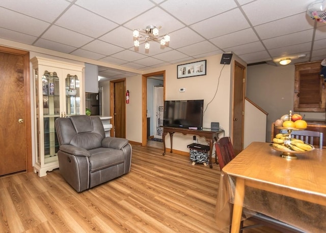 140 College Farm Rd, Waltham, MA 02451 - living room featuring light wood-type flooring and a paneled ceiling
