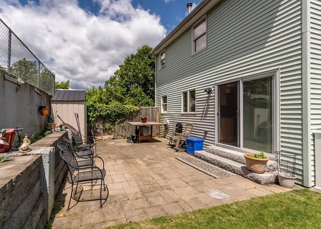 140 College Farm Rd, Waltham, MA 02451 - fenced backyard with a patio