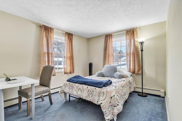 bedroom featuring carpet, a textured ceiling, and baseboard heating