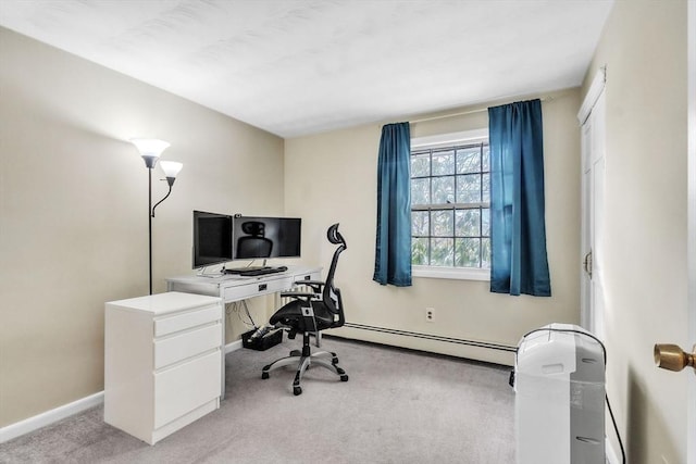 office with a baseboard heating unit and light carpet