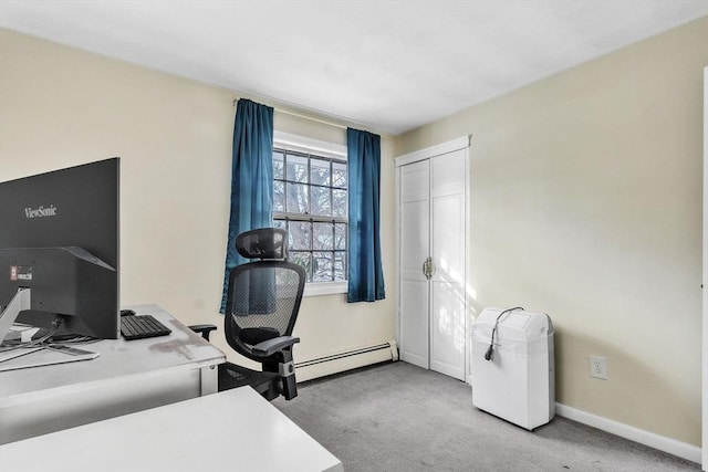 office area with light colored carpet and baseboard heating