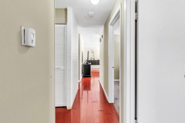 hall featuring wood-type flooring