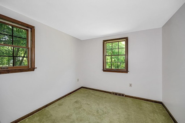 10 Corcoran Dr, Tyngsborough, MA 01879 - carpeted empty room featuring baseboards