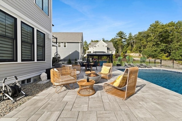 view of patio / terrace featuring a fenced in pool