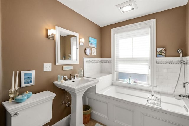 31 Mead St, Boston, MA 02129 - bathroom featuring a bath and toilet