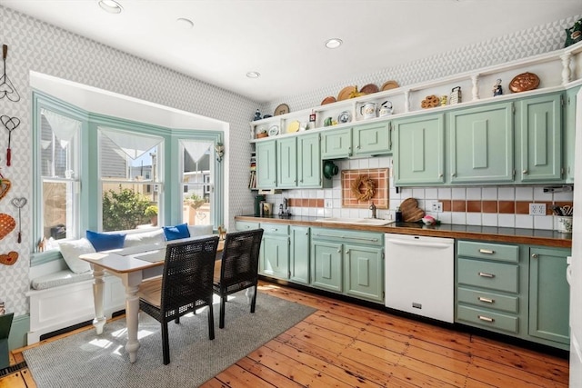 31 Mead St, Boston, MA 02129 - kitchen with dishwasher, green cabinetry, wallpapered walls, open shelves, and recessed lighting