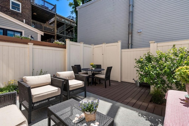31 Mead St, Boston, MA 02129 - wooden terrace with outdoor dining area and a fenced backyard