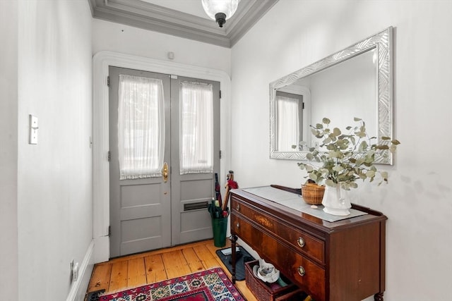 31 Mead St, Boston, MA 02129 - entryway featuring light wood-style floors, french doors, and ornamental molding