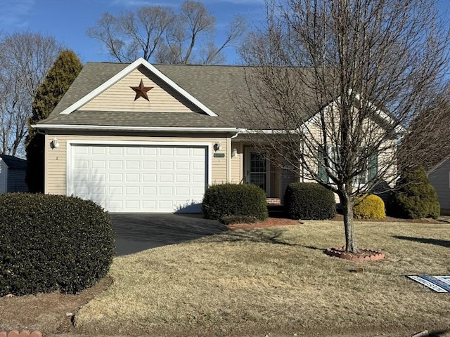 exterior space with a garage and a lawn