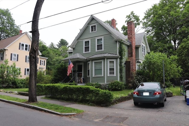 3 Moraine St, Andover, MA 01810 - view of front facade with a chimney