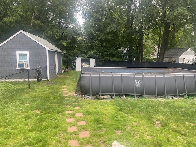 3 Moraine St, Andover, MA 01810 - view of yard with cooling unit, an outdoor pool, and a shed