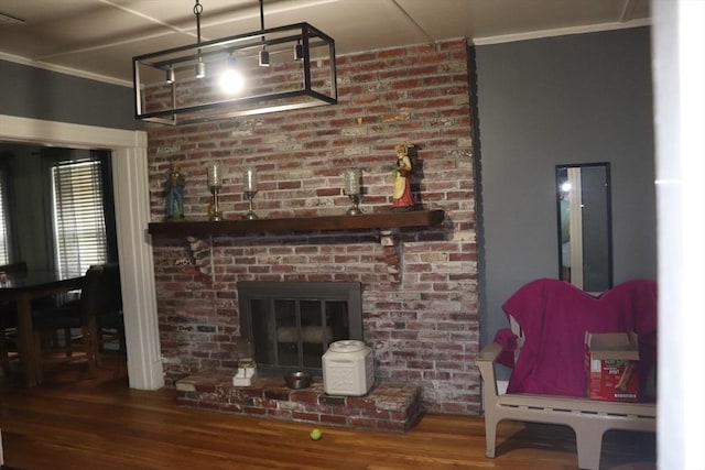 3 Moraine St, Andover, MA 01810 - living room featuring ornamental molding, wood finished floors, and a fireplace