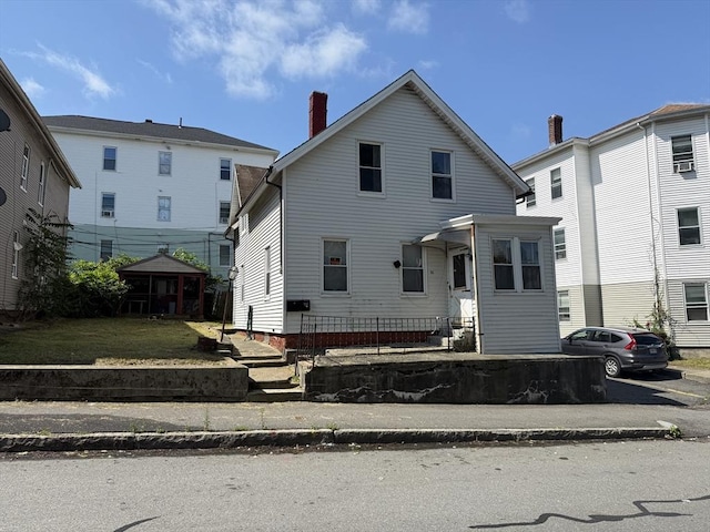 64 Suffolk St, Worcester, MA 01604 - view of front of house with a chimney