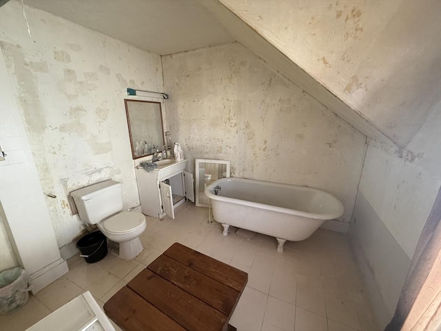 64 Suffolk St, Worcester, MA 01604 - bathroom with a freestanding bath, tile patterned flooring, and vanity