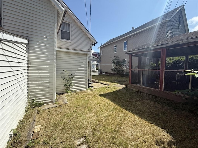 64 Suffolk St, Worcester, MA 01604 - view of green lawn featuring a sunroom