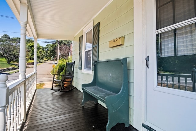 wooden terrace with covered porch