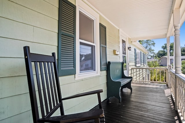 wooden terrace with a porch