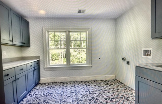 45 Widow Rites Ln, Sudbury, MA 01776 - laundry room featuring cabinet space, hookup for a washing machine, wallpapered walls, electric dryer hookup, and baseboards