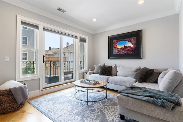 37 P St Unit 2, Boston, MA 02127 - living room featuring plenty of natural light, wood finished floors, crown molding, and recessed lighting