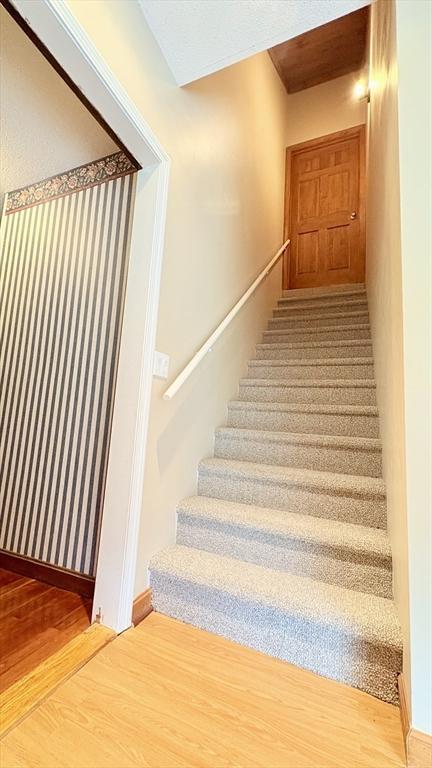 67 Amherst Rd Unit 67, South Hadley, MA 01075 - stairway with wood finished floors
