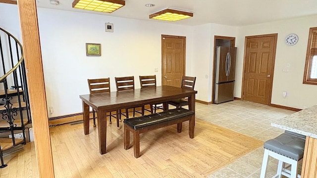 67 Amherst Rd Unit 67, South Hadley, MA 01075 - dining room featuring stairs and light wood-type flooring