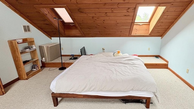 67 Amherst Rd Unit 67, South Hadley, MA 01075 - carpeted bedroom featuring a skylight, lofted ceiling, and wooden ceiling