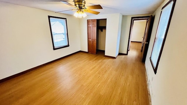 67 Amherst Rd Unit 67, South Hadley, MA 01075 - unfurnished bedroom with light wood finished floors, a closet, and ceiling fan