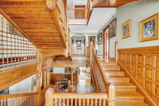 staircase featuring wood ceiling