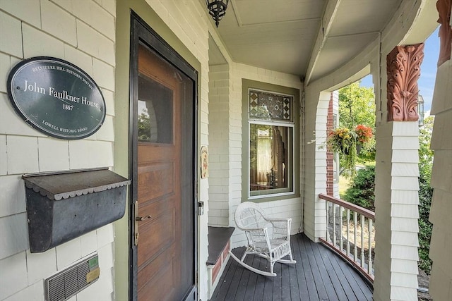 wooden deck featuring covered porch