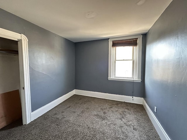 unfurnished room with carpet