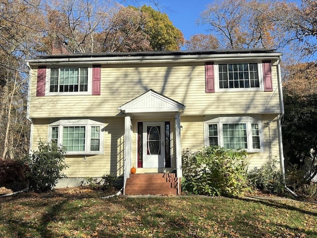 view of front of house with a front lawn