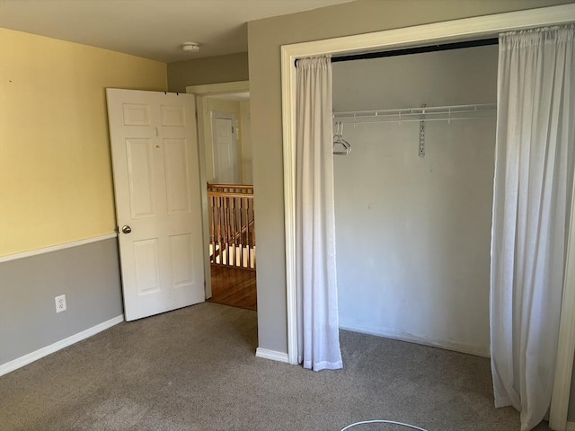 194 Paine St, Bellingham, MA 02019 - unfurnished bedroom featuring baseboards, carpet, and a closet