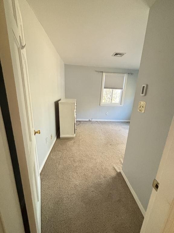 194 Paine St, Bellingham, MA 02019 - spare room with baseboards, light colored carpet, and visible vents