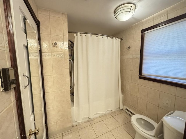 194 Paine St, Bellingham, MA 02019 - full bath featuring tile walls, shower / bath combo, tile patterned floors, a baseboard heating unit, and toilet