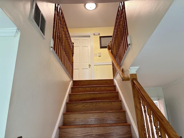 194 Paine St, Bellingham, MA 02019 - staircase with baseboards, ornamental molding, and visible vents