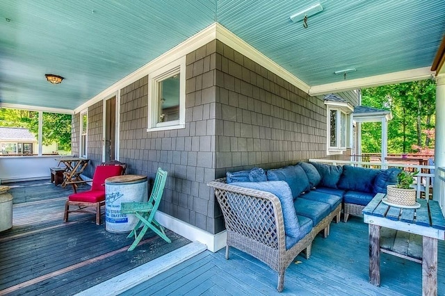 265 Stone St, Walpole, MA 02081 - wooden porch featuring an outdoor living space