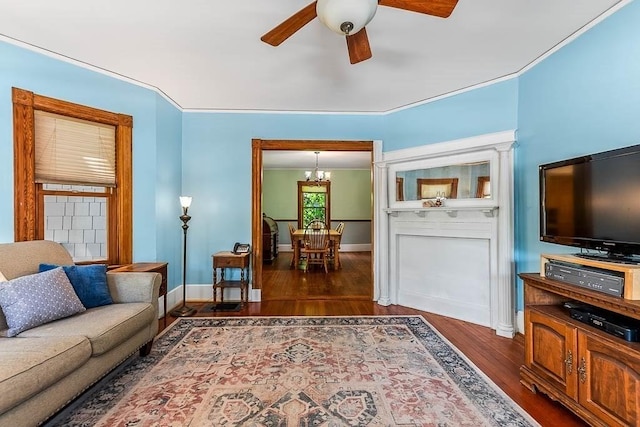 265 Stone St, Walpole, MA 02081 - living room featuring a chandelier, ceiling fan, wood finished floors, and baseboards