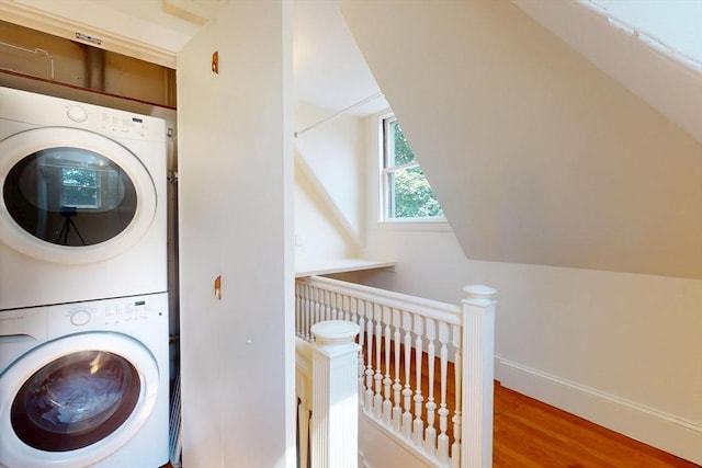 12 Bigelow Cir Unit 3, Boston, MA 02135 - laundry area featuring stacked washer / drying machine and wood finished floors