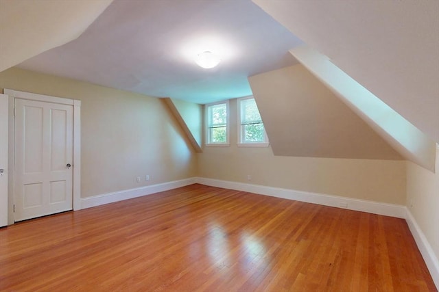 12 Bigelow Cir Unit 3, Boston, MA 02135 - additional living space with light wood-style flooring and vaulted ceiling