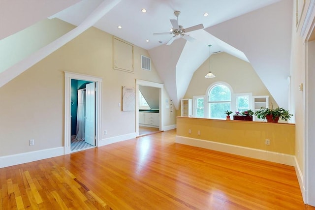 12 Bigelow Cir Unit 3, Boston, MA 02135 - additional living space featuring light wood finished floors, a ceiling fan, and vaulted ceiling