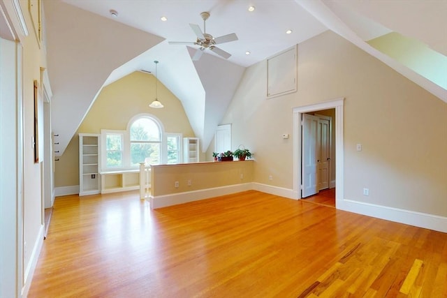 12 Bigelow Cir Unit 3, Boston, MA 02135 - unfurnished living room featuring light wood-style floors, a ceiling fan, vaulted ceiling, and recessed lighting